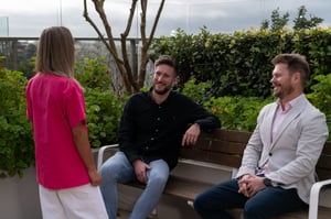 Josh and Ed on bench talking to nurse right side shot