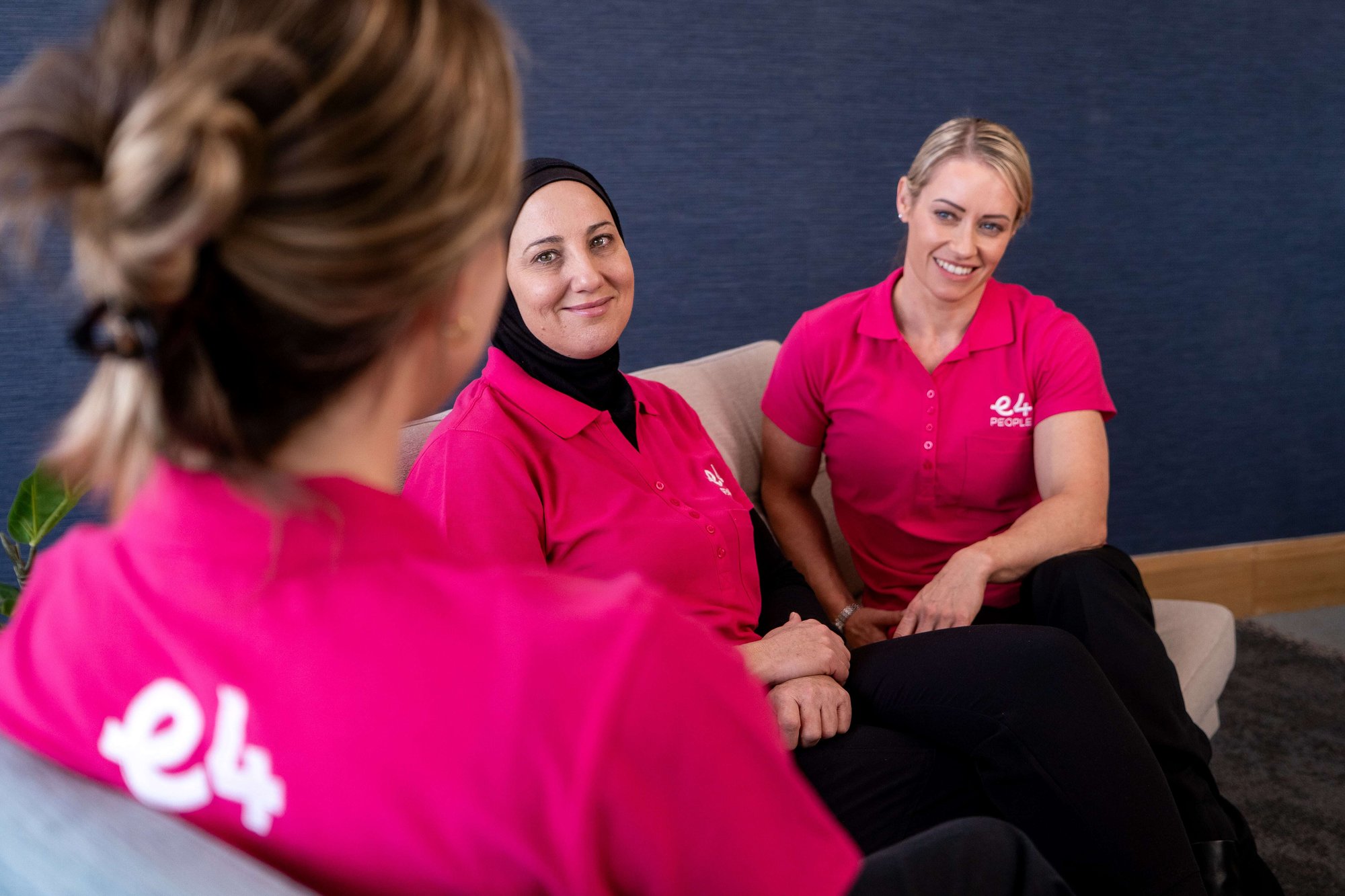 Three E4 nurses talking to eachother in a sofa Three E4 nurses talking to eachother in a sofa
